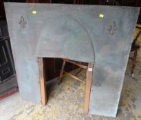 A VINTAGE COPPER FIRE SURROUND with fleur de lis decoration, 100cms tall x 102cms wide