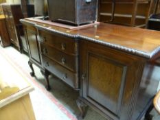 ANTIQUE MAHOGANY SIDEBOARD having three centre drawers, flanking cupboards, ball and claw supports