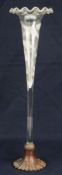 VICTORIAN ETCHED GLASS TRUMPET VASE having leaf etched body and frilly neck mounted within a
