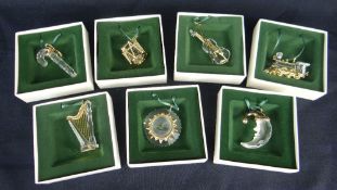 SEVEN SWAROVSKI CRYSTAL CHRISTMAS TREE CHARMS (boxed) including toy steam train, harp and violin