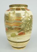 SATSUMA POTTERY BALUSTER VASE typically landscape decorated and gilded, 19cms high
