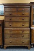 ANTIQUE OAK CHEST ON CHEST with eight drawers and turned knobs on bracket feet, 199cms h x 118cms w