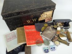 VINTAGE BLACK PAINTED DEED TIN CONTAINING MILITARY COLLECTABLES including the soldier's silver