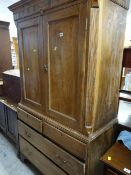 ANTIQUE PRESS CUPBOARD having a base of two long and two short drawers, 182cms h x 102cms w