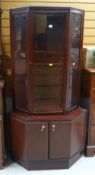 A MODERN MAHOGANY CHINA CABINET with base cupboard