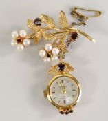 9CT GOLD LADIES ROTARY BAR BROOCH WATCH set with pearls and garnets, 11.1gms overall