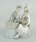 LLADRO PORCELAIN MODEL OF A COURTSHIP SCENE with two seated figures in a conversation-settee with