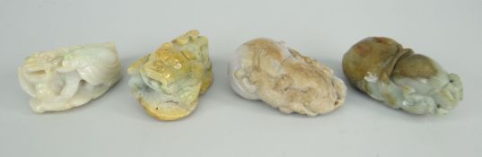 FOUR ITEMS OF BELIEVED CHINESE JADE ITEMS including toggle of naturalistic form with scroll-type