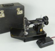 VINTAGE CASED SINGER SEWING MACHINE, electric driven, model number CAT.CAK6-12