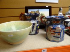 PAINTED PORCELAIN PLAQUE OF AN OLDE ENGLAND SCENE of horsemen, bridge and Tudor buildings, within