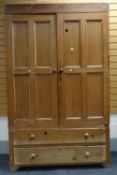 GOOD EARLY 20TH CENTURY PINE LIVERY CUPBOARD, two long base drawers, internal hanging hooks,