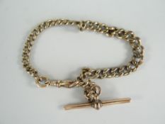 9CT GOLD GRADUATED FLAT CURB LINK BRACELET WITH T-BAR, 20.4gms