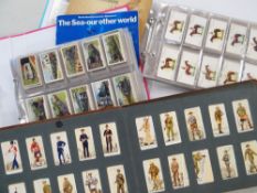 THREE MODERN FOLDERS OF VINTAGE CIGARETTE CARDS & VARIOUS BOOKLETS OF PICTURE CARDS