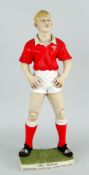 GROGG MODEL OF FORMER WALES INTERNATIONAL RUGBY PLAYER NEIL JENKINS poised to take a place-kick,