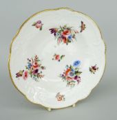 NANTGARW PORCELAIN SOUP DISH of alternate lobed form, the border moulded with ribbons, flowers and
