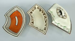 THREE SWANSEA CREAMWARE CURVED SECTIONAL DISHES FROM SUPPER SETS one with cover and loop handle,