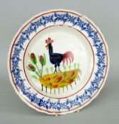 LLANELLY COCKEREL PLATE typically decorated with sponged leaves to the border, 24.5cms diam
