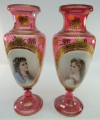 PAIR OF BOHEMIAN RUBY OVERLAY GLASS VASES of baluster form, spreading circular feet, overlaid in