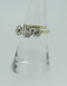 18CT YELLOW GOLD AND PLATINUM THREE STONE DIAMOND RING, the three stones approximately 1.5cts