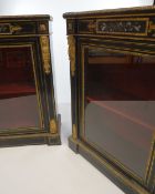 PAIR OF 19TH CENTURY PIER CABINETS ebony and gilt mounted including caryatids, single glazed door,