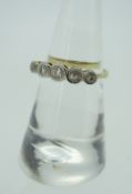 18CT YELLOW GOLD AND PLATINUM FIVE STONE DIAMOND ILLUSION SET RING, 2.4 grams. Condition Report: