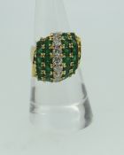 18CT YELLOW GOLD DIAMOND AND EMERALD FIVE ROW RING, the seven diamonds approximately 0.5cts overall,