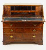 GEORGIAN MAHOGANY BUREAU four long drawers, sloped front hinging to reveal inlaid drawers, pigeon
