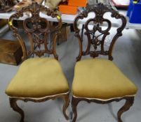 PAIR OF ANTIQUE ORNATELY CARVED HALL CHAIRS (A.F)