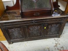 ANTIQUE OAK THREE PANELED COFFER with carved decoration