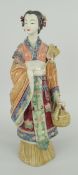JAPANESE POTTERY GEISHA FIGURE kimono in polychrome glaze, holding fan and food canteen,