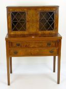 FIGURED WALNUT BOOKCASE BUREAU of small proportions, the base with two long drawers, fold over
