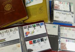 ASSORTED STAMP ALBUMS containing Royal Mail G.B First Day Covers and a folder of Guernsey First