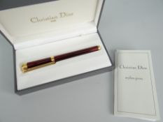 CASED CHRISTIAN DIOR STYLOS-PEN fountain-pen with 14k gold nib, paperwork dated 1999