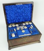 VICTORIAN BRASS INLAID ROSEWOOD SEWING BOX of sarcophagus form with monogrammed rectangular panel to