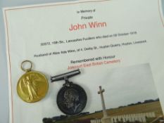 WWI MEDAL GROUP ENGRAVED TO 30972 PRIVATE J WYNN OF THE LANCASHIRE FUSILIERS comprising British