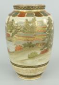 SATSUMA POTTERY BALUSTER VASE typically landscape decorated and gilded, 19cms high