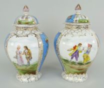 PAIR OF AUSTRIAN PORCELAIN COVERED VASES decorated in gilding and alternate panels of Romantic