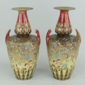 PAIR OF DOULTON LAMBETH & SLATERS TWIN-HANDLED VASES having baluster bodies, tapered and flared