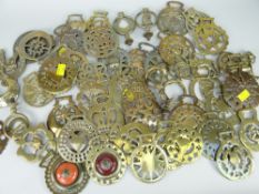 ASSORTED ANTIQUE HORSE BRASSES two with glazed ceramic centres and some with Welsh locations ETC