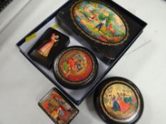 FIVE VINTAGE PAPIER MACHE CONTAINERS decorated with medieval and pastoral scenes