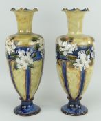 PAIR OF ROYAL DOULTON STONEWARE VASES of obovoid form, narrow necked with crimped rim, spreading
