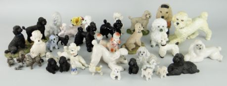 APPROXIMATELY THIRTY CERAMIC & OTHER SMALL POODLE MODELS