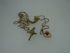 TWO YELLOW METAL NECKLACES one with heart pendant, the other with crucifix, both marked for 9ct gold