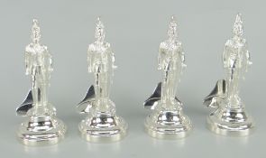 SET OF FOUR SILVER MENU HOLDERS IN THE FORM OF QUEENS HORSE GUARDS each standing on bell-shaped