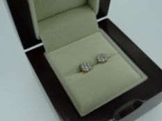 PAIR OF YELLOW METAL DIAMOND EARRINGS with gem specification card, in box