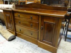 VINTAGE MAHOGANY BREAK-FRONT SIDEBOARD, flanking cupboards to three graduated centre drawers with