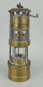 E. THOMAS & WILLIAMS LIMITED ABERDARE MINER'S LAMP, small version with brass base, white metal body,