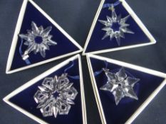 FOUR BOXED SWAROVSKI CRYSTAL ANNUAL CHRISTMAS TREE ORNAMENTS 1997-2000