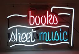 MID-CENTURY NEON ELECTRIC RETAILER'S SIGN with perspex cover 'Sheet Music / Books', 77 x 51cms