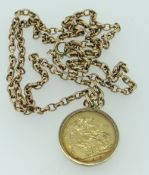 GEORGE V 1913 GOLD FULL SOVEREIGN IN 9CT GOLD MOUNT on 9ct yellow gold oval link chain, 23.9gms